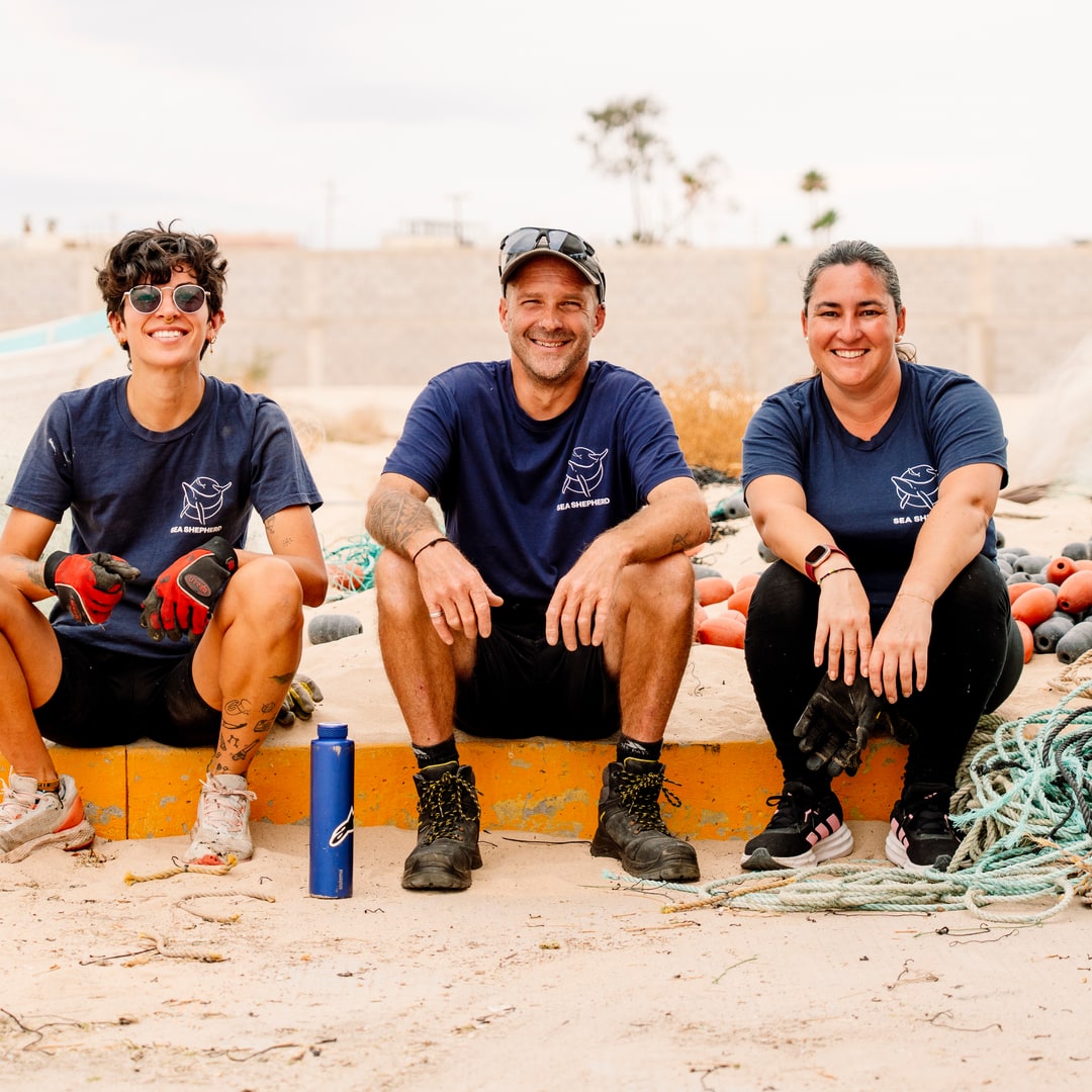 Sea Shepherd crew members with recovered fishing gear